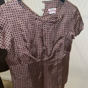 Beautiful blouse with opening in the front  and side zipper